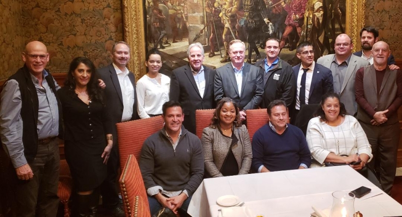 Pictured in the &#039;tableau&#039; photo are (standing left to right) Jon Seavey, Gilbane Construction; Edith Yañez, MDCHCA; Russell Phillips, Cohn Reznick; Jessica Elias, Gilbane; Chris Kerns, Fort Myer Construction; Jim Christian, Consigli Construction; Billy Rocha, FH Paschen Construction; Luis Clavijo, First Citizens Bank; Stephen Courtien, Balt./Wash. Building Trades Unions, Mark Bellingham, Monarc Construction, (Seated l to r) Edwin Villegas, Winmar Construction; Tyra Redus, Skanska Construction; Carlos Perdomo, Keystone Plus Construction and Carolyn Ellison, Turner Construction.